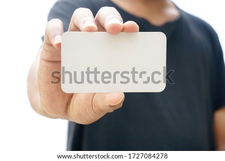  businessman holding blank white card