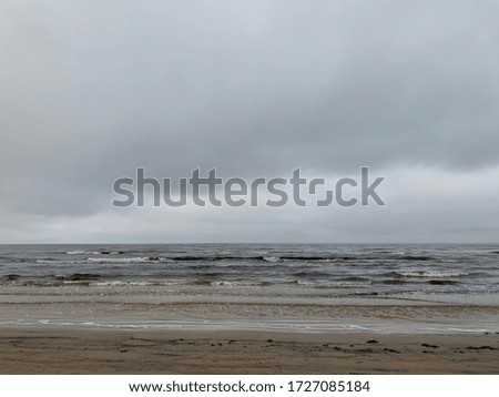Storm on Baltic Sea pictured on windy and cloudy winter day