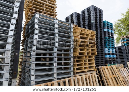 Different types of pallets are stacked in a row , Can be used as a background