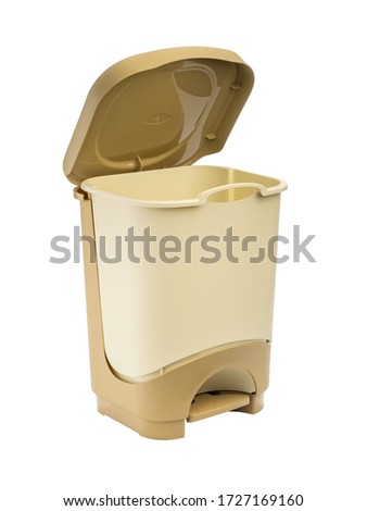 plastic bucket beige color for garbage with a convenient pedal for opening the lid