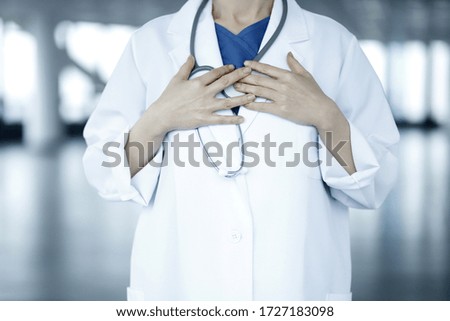 Doctor with hands on chest. Grateful,trust gesture.Health concept.