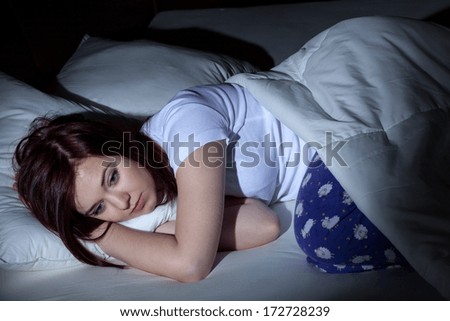 Woman cant sleep at the night because of her problems Royalty-Free Stock Photo #172728239