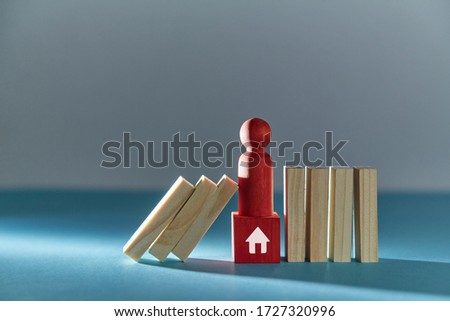 Social distance. Stay away from people. Stay home and stay safe. Self isolation concept. Wooden red figure and blocks Royalty-Free Stock Photo #1727320996