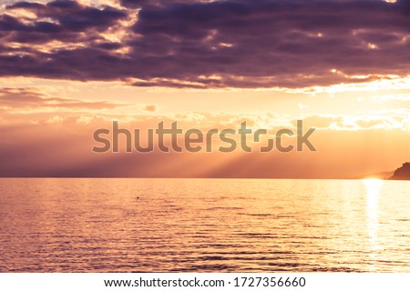 Cloudy Sunset over Lake Leman Clear Waters and Vevey Riviera Royalty-Free Stock Photo #1727356660