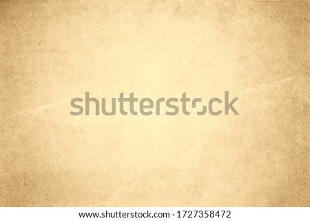 Aged texture of old vintage brown paper, can be use as abstract background, wallpaper,  webpage, copy space for text.