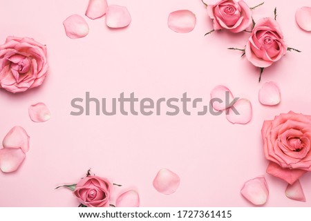 Monochrome Arrangement of beautiful roses. Flower roses frame on pink pastel background. Mothers day, Valentines Day, Birthday Greeting card. Royalty-Free Stock Photo #1727361415