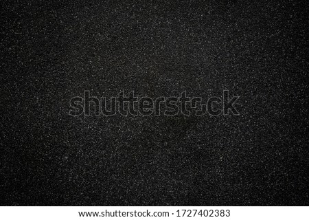 Black asphalt floor or road texture background. Black small stone floor texture background. Royalty-Free Stock Photo #1727402383