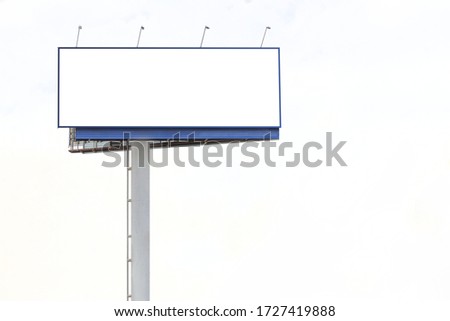 Street empty blank billboard for outdoor advertising poster with copy space on blue sky background. Billboard mockup outdoors