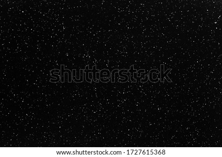 Black plastic cutting board spotted with white dots. Royalty-Free Stock Photo #1727615368