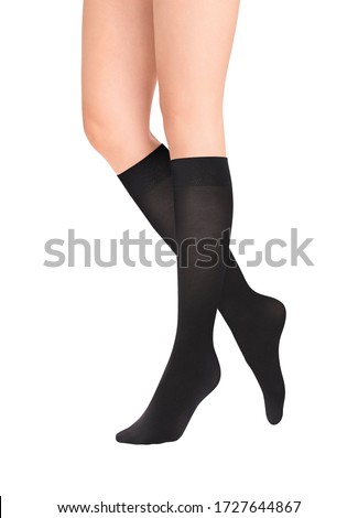 Medical Compression Stockings for varicose veins and venouse therapy. Compression Hosiery.  Sock for sports isolated on white background. Black color socks as mock up for advertising, branding, design