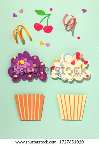 Paper cutting cupcake on isolated background. Handmade art work. Colorful sprinkles, dot and star, for your birthday card design. Confetti. Holiday inspiration. 