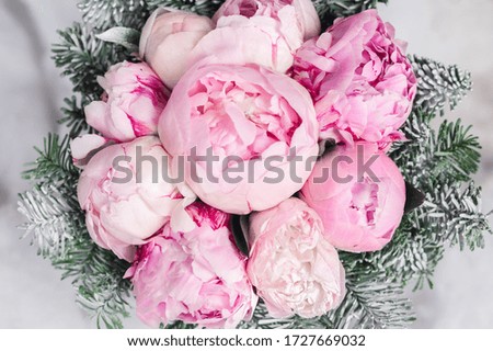 Christmas Bouquet of flowers. Pink peonies. Top view, close up