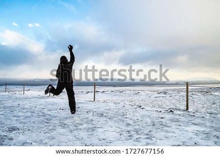 
jump winter in snowy landscape
