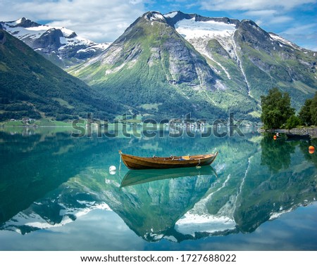 Idyllic scenery in Hjelle, Stryn, Norway. Reflections at its best Royalty-Free Stock Photo #1727688022