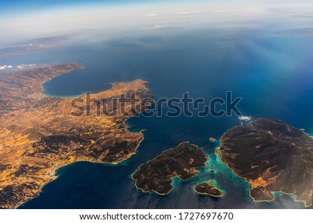A view over some islands of Greece. The picture was taken from the airplane's window.