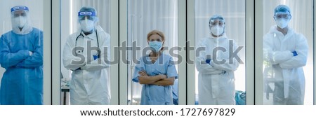 caucasian senior coronavirus covid-19 infected patient and doctor with medical team having arm crossing for photography together in quarantine room at hospital, coronavirus covid-19 medical team