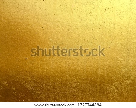 Gold color wall surface texture background design 