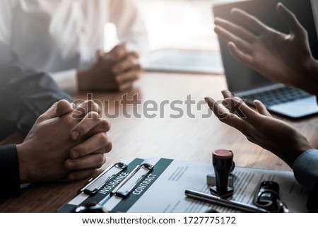 Businessman and lawyer discuss the contract document. Treaty of the law. Sign a contract business.