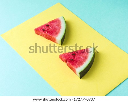 Sliced Watermelon on white plate with spoon and fork stock photo with white background.
