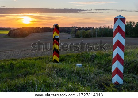 The Polish-German state border. Border posts on the border during sunset