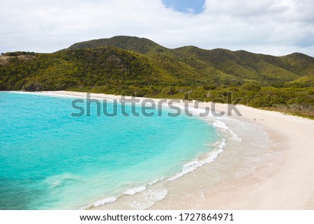 The pristine and hard to reach beach in the Rendezvous Bay in Antigua. Royalty-Free Stock Photo #1727864971