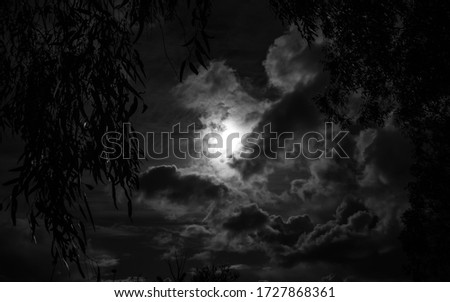 Black and white photo of a cloudy sky