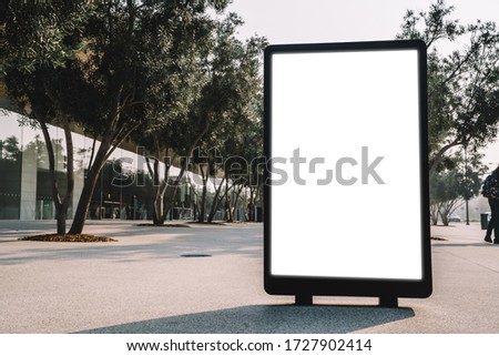 Street billboard with blank copy space screen for advertising text message or promotional content, empty mock up Lightbox for information, modern clear board poster display in public urban city street