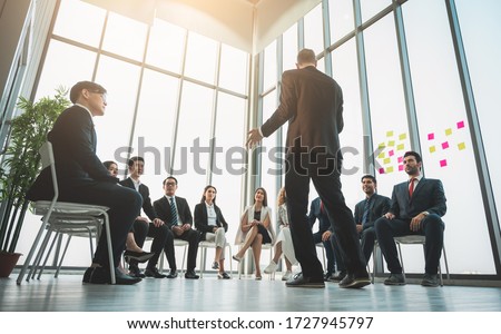 Business People Meeting Conference Discussion Corporate Concept in office. Team of newage Multiethnic Diverse Busy Business People in seminar Concept. Royalty-Free Stock Photo #1727945797