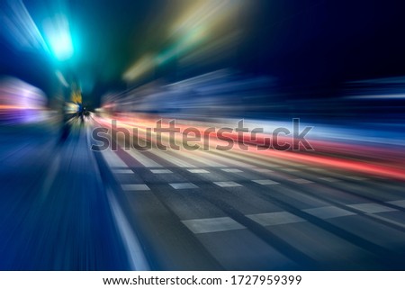 Blurred car lights in a night scene