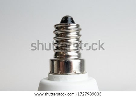 E14 light bulb screw fit. Close up. Royalty-Free Stock Photo #1727989003
