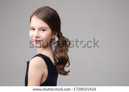 Portrait of beautiful young girl is happy, picture isolated on white background