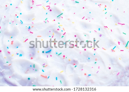Confectionery Topping. Colored topping for cakes. Sprinkled cream cake