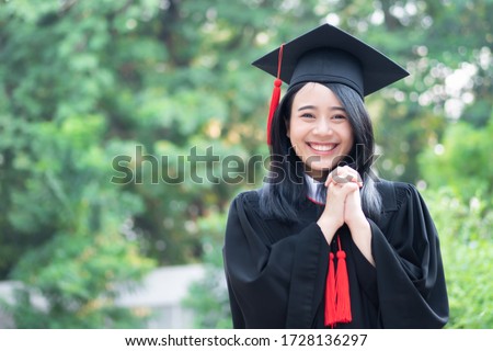 happy smiling college student graduating; concept of successful education, happy commencement day, woman education equality, employment opportunity, high education degree, overseas study scholarships Royalty-Free Stock Photo #1728136297