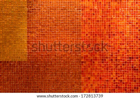Red mosaic background on the wall