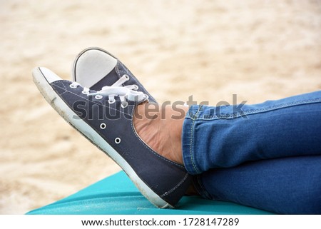 Blue and White Sneakers At the Beach