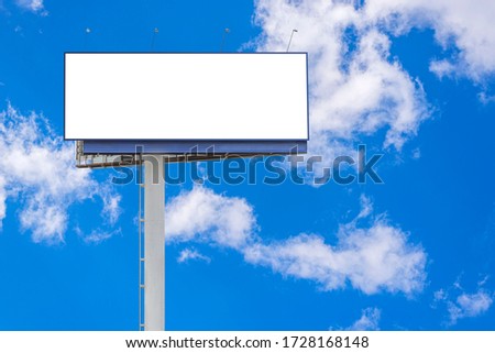 Street empty blank billboard for outdoor advertising poster with copy space on blue sky background. Billboard mockup outdoors