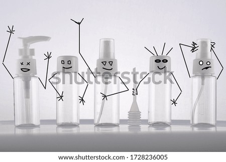 a set of fun plastic bottles for cosmetics and antiseptics to protect against the virus