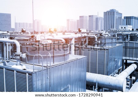 large central air conditioning system cooling fan system pipeline Royalty-Free Stock Photo #1728290941