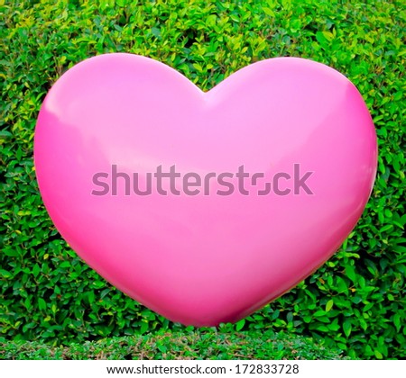 Valentines day Abstract  Love Concept , Big pink heart on green background 