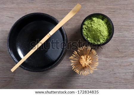 Japanese tea ceremony setting on old wooden bench. Studio photo. Green tea utensils. From top. Royalty-Free Stock Photo #172834835