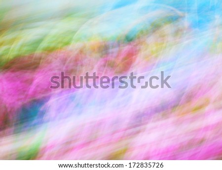 Photo art, bright Colorful light streaks abstract background in blue, purple, yellow and green colors