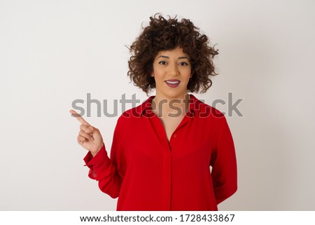 Photo of pretty business woman indicating finger empty space sales manager wear modern stylish red shirt isolated white color background