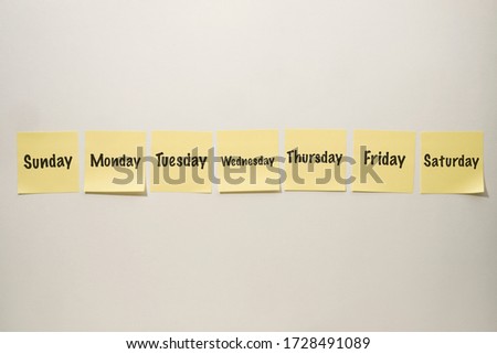 Yellow Sticky Notes on a White Background with the Days of the Week Written on Them