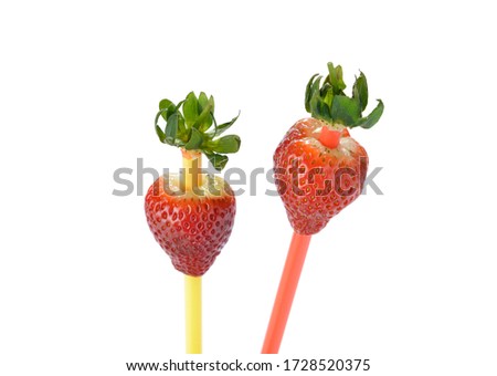 Life hack; Insert the straw into the side opposite to the stem and press it up through the center of the strawberry