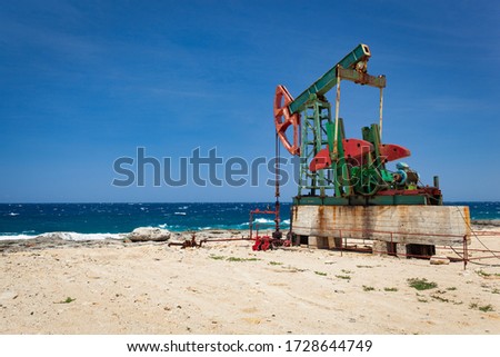 Oil recovery pump by the ocean