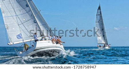 Sailing yacht regatta. Sailboats under sail in the race. Yachting. Sailing Royalty-Free Stock Photo #1728758947