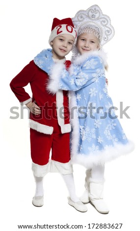 children in Christmas costume on white background
