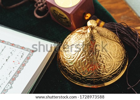 Oriental religious beads close up on a wooden table with coffee