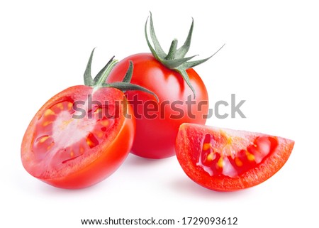 One whole and two cut fresh, red tomatoes isolated on white background. Clipping path. Full depth of field.