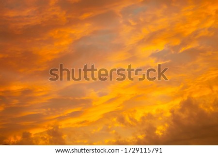 Beautiful colored clouds on the natural background of the sky. Toned.